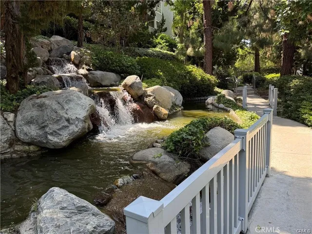 a view of a lake with a house