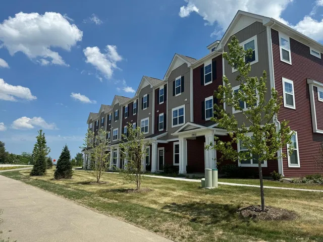 a view of a building with a street