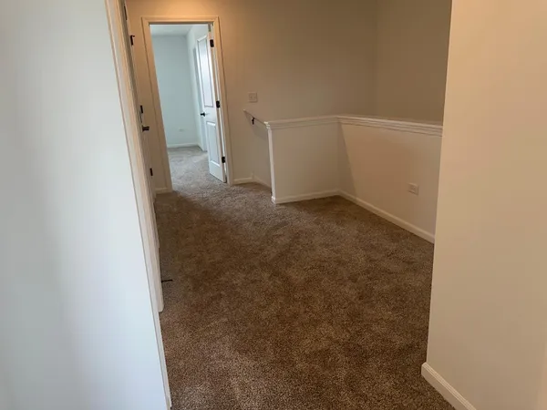a bathroom with a sink toilet vanity and shower