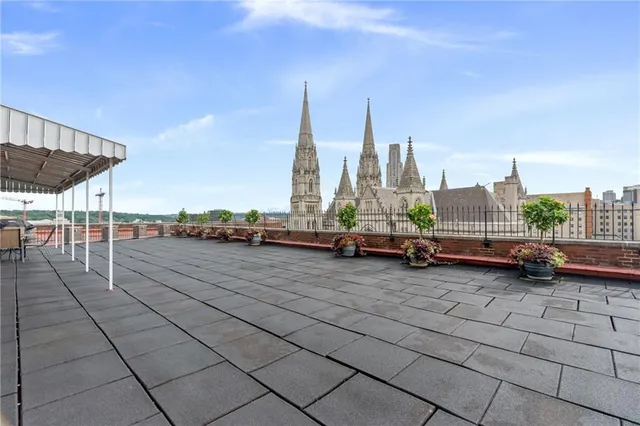 a view of a terrace with chairs
