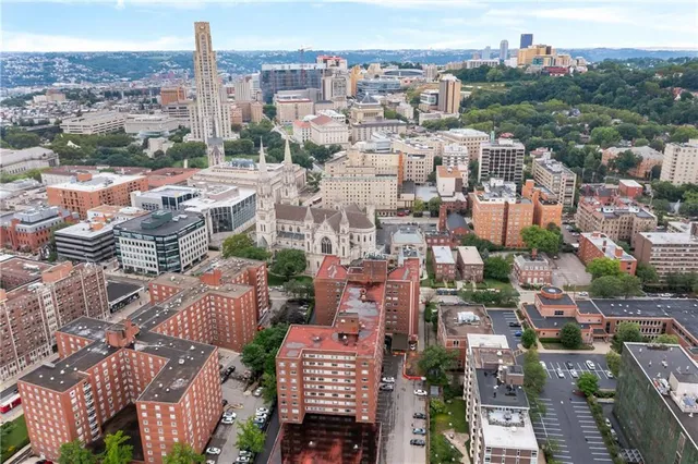 an aerial view of a city with lots of residential buildings