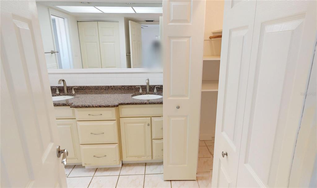 2028 River Basin Terrace Punta Gorda, FL 33982 - Photo 14 of 40 a bathroom with a sink and a mirror