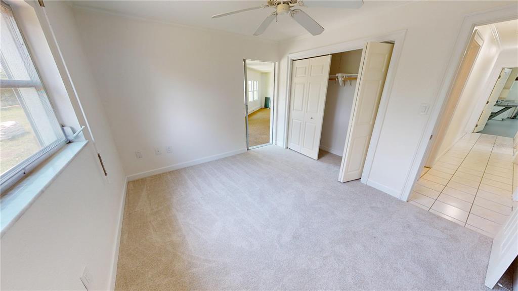 2028 River Basin Terrace Punta Gorda, FL 33982 - Photo 20 of 40 an empty room with a mirror