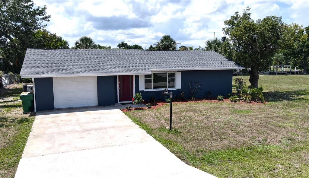 2028 River Basin Terrace Punta Gorda, FL 33982 - Photo 2 of 40 a house view with a backyard space
