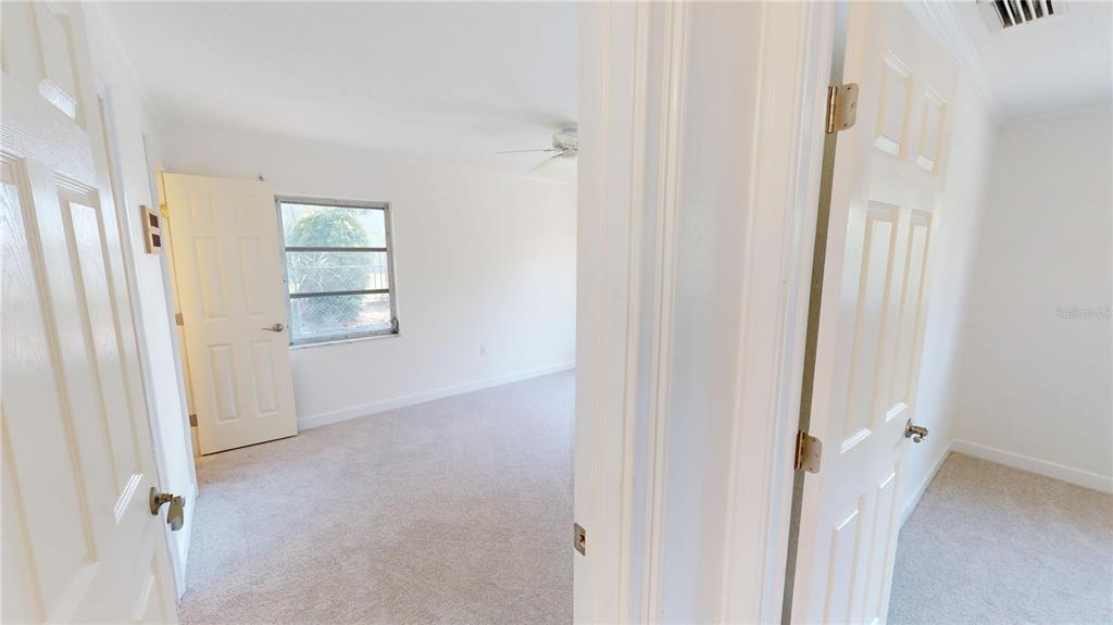 2028 River Basin Terrace Punta Gorda, FL 33982 - Photo 23 of 40 an empty room with windows