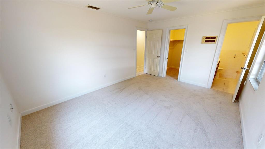 2028 River Basin Terrace Punta Gorda, FL 33982 - Photo 25 of 40 a view of a hallway with wooden wall