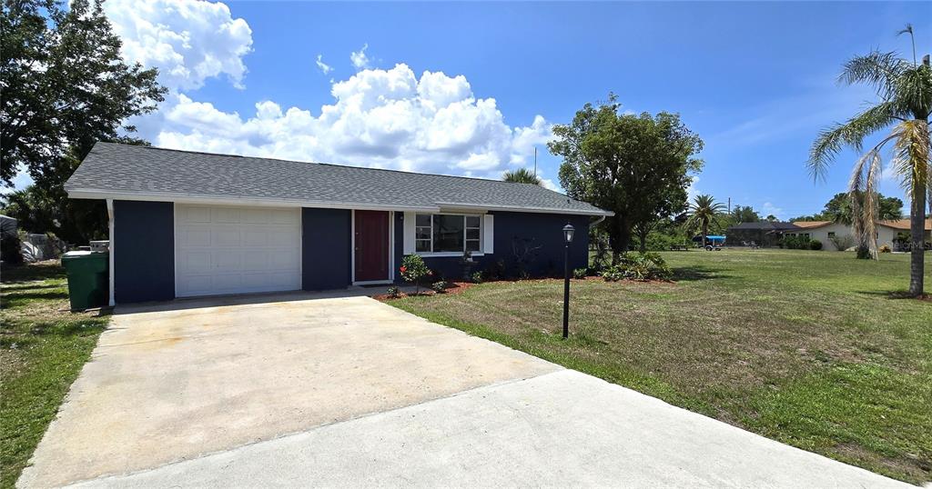 2028 River Basin Terrace Punta Gorda, FL 33982 - Photo 35 of 40 a house view with a backyard space