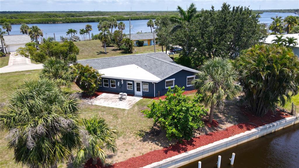 2028 River Basin Terrace Punta Gorda, FL 33982 - Photo 36 of 40 a view of a house with a yard and sitting area