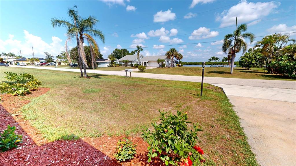 2028 River Basin Terrace Punta Gorda, FL 33982 - Photo 4 of 40 a park with lots of potted plants