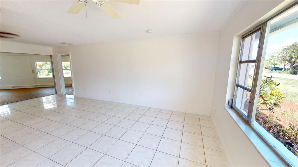 2028 River Basin Terrace Punta Gorda, FL 33982 - Photo 6 of 40 a view of an empty room and window