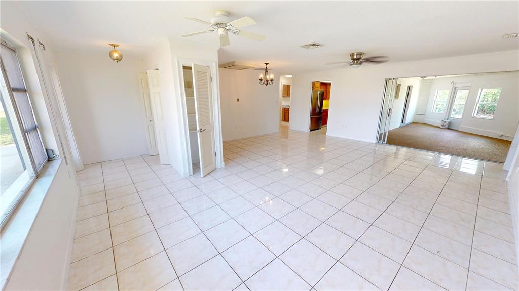 2028 River Basin Terrace Punta Gorda, FL 33982 - Photo 7 of 40 a view of a livingroom with furniture and an entryway