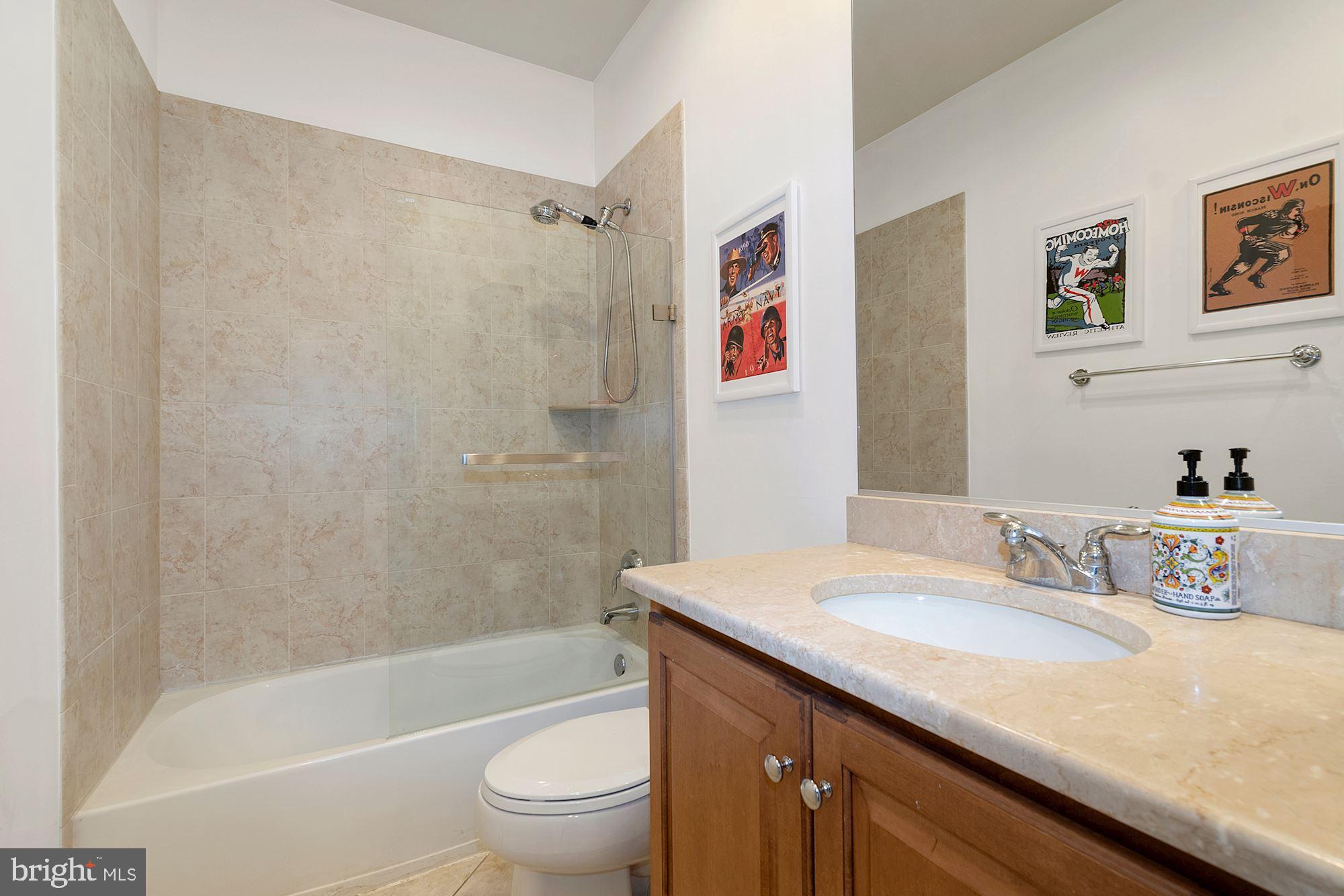 9502 Ament Street Silver Spring, MD 20910 - Photo 33 of 48 Full Hall bathroom