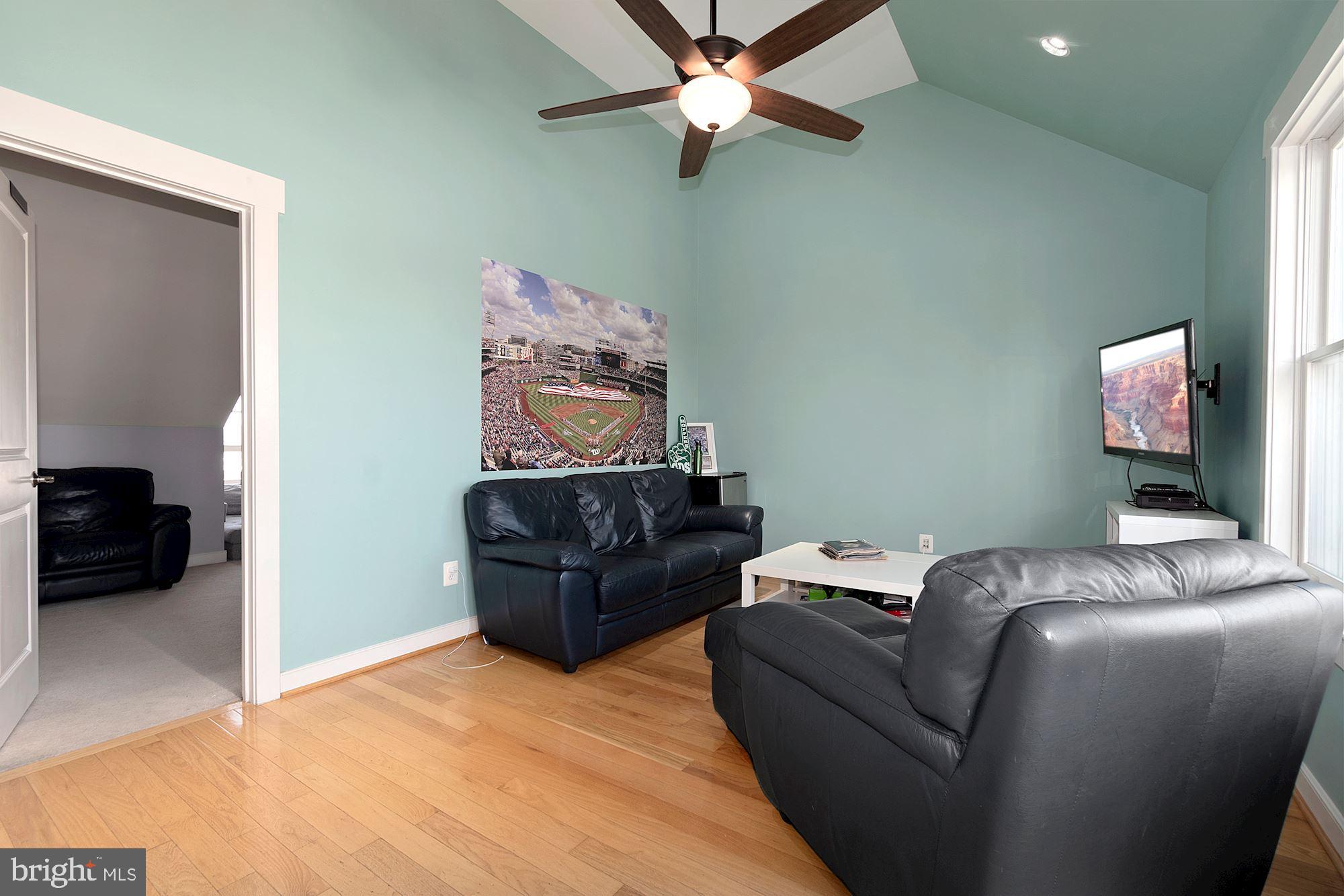 9502 Ament Street Silver Spring, MD 20910 - Photo 36 of 48 Livingroom #3 (He/she cave) on the 4th floor