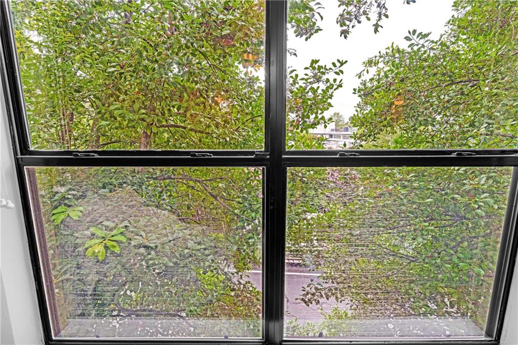 821 Ralph McGill Boulevard Northeast, Unit 2303 Atlanta, GA 30306 - Photo 16 of 43 a view of with green trees