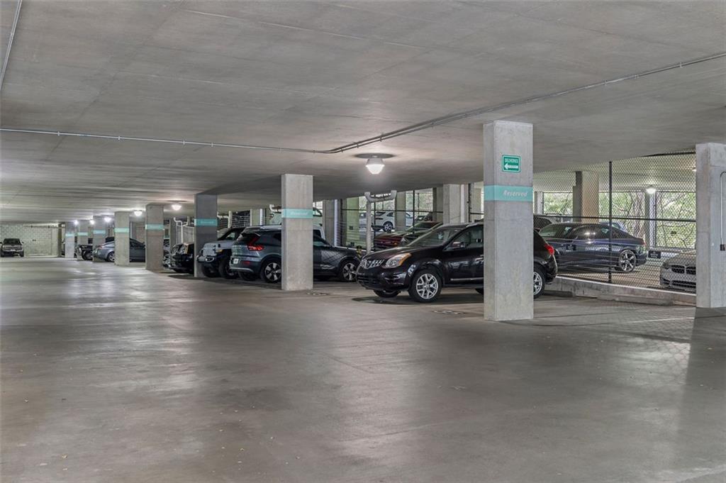 821 Ralph McGill Boulevard Northeast, Unit 2303 Atlanta, GA 30306 - Photo 28 of 43 a view of a garage with cars