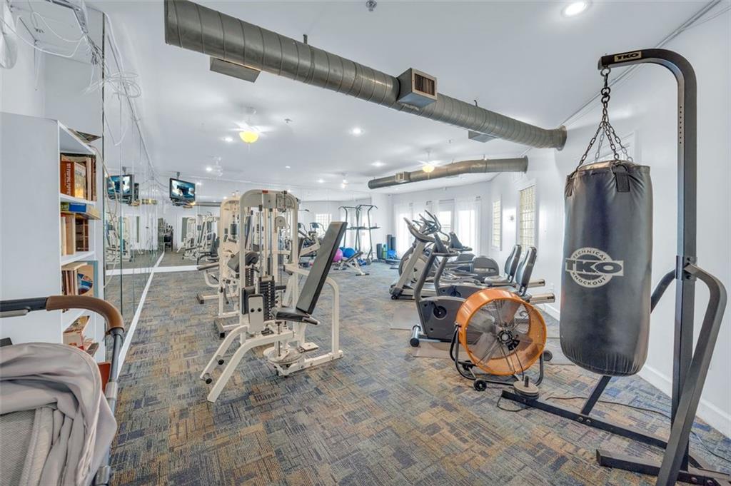 821 Ralph McGill Boulevard Northeast, Unit 2303 Atlanta, GA 30306 - Photo 39 of 43 a view of a room with gym equipment