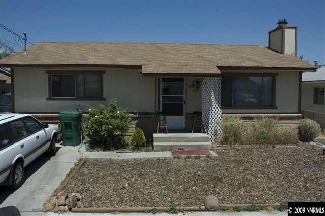 418 Wonder Street Reno, NV 89502 - Photo 1 of 1 a front view of a house with garden