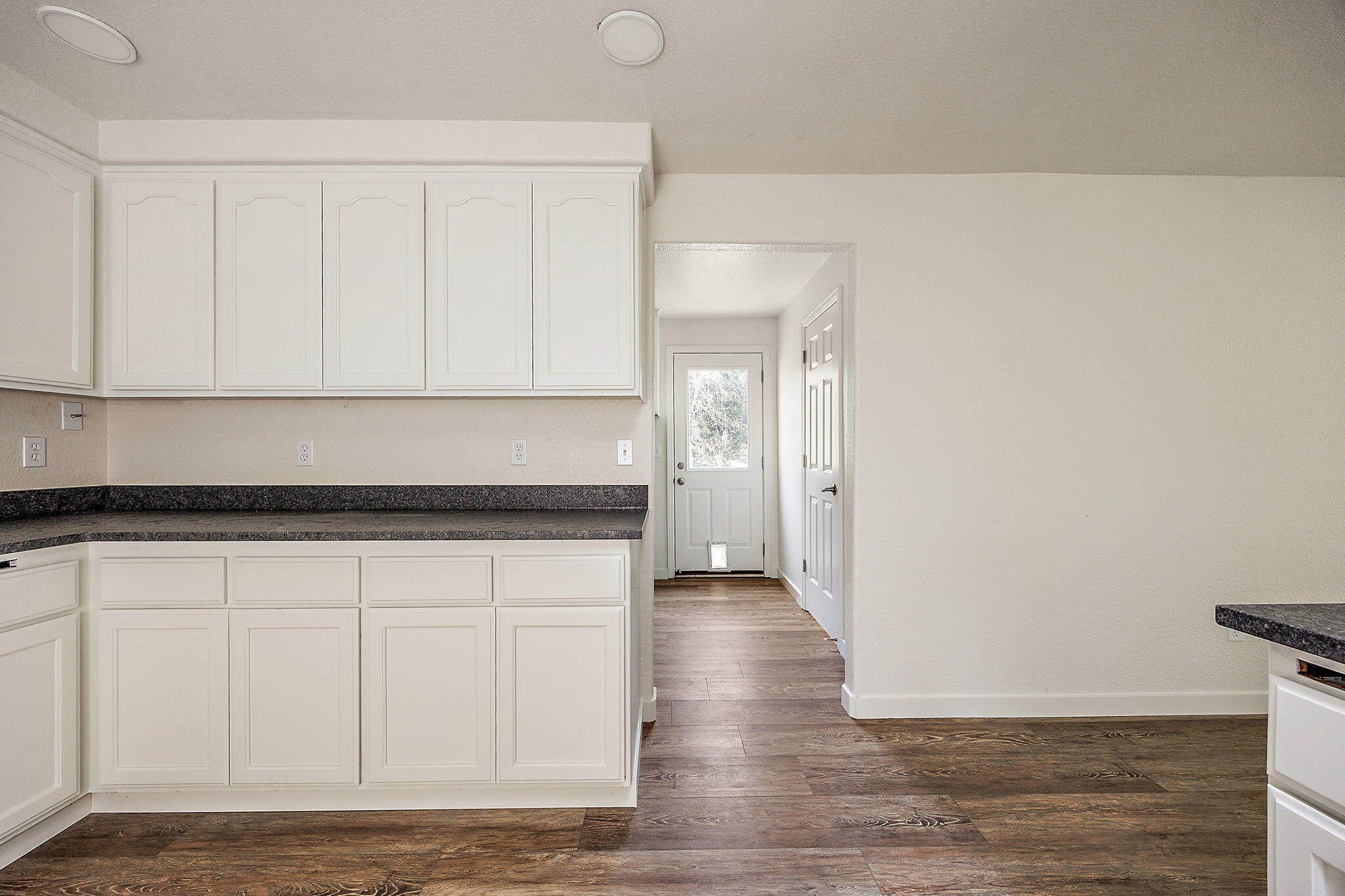 7919 Lower River Road Grants Pass, OR 97526 - Photo 8 of 27 Kitchen leads to Indoor Laundry Room