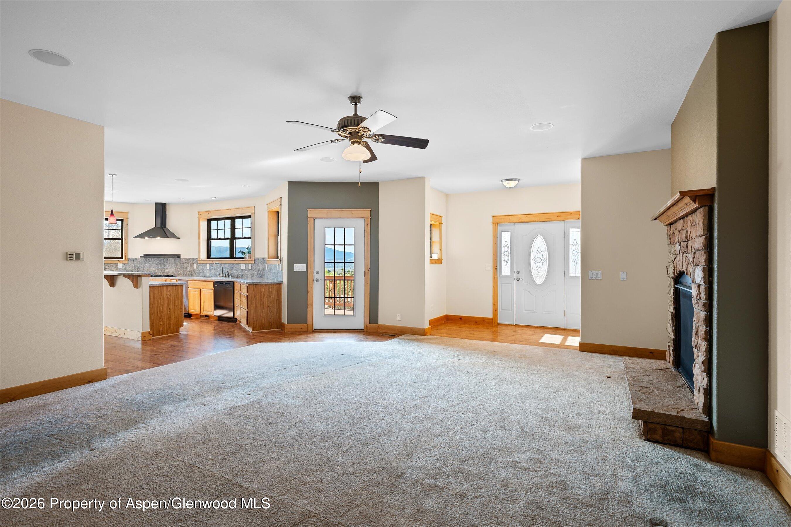 450 Summer Falls Road Silt, CO 81652 - Photo 11 of 50 a view of empty room with window and ceiling fan