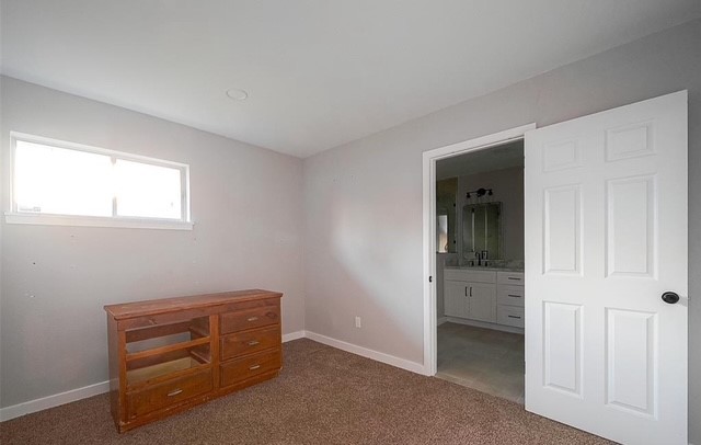 4800 Country Club View Baytown, TX 77521 - Photo 24 of 35 an empty room with windows and closet