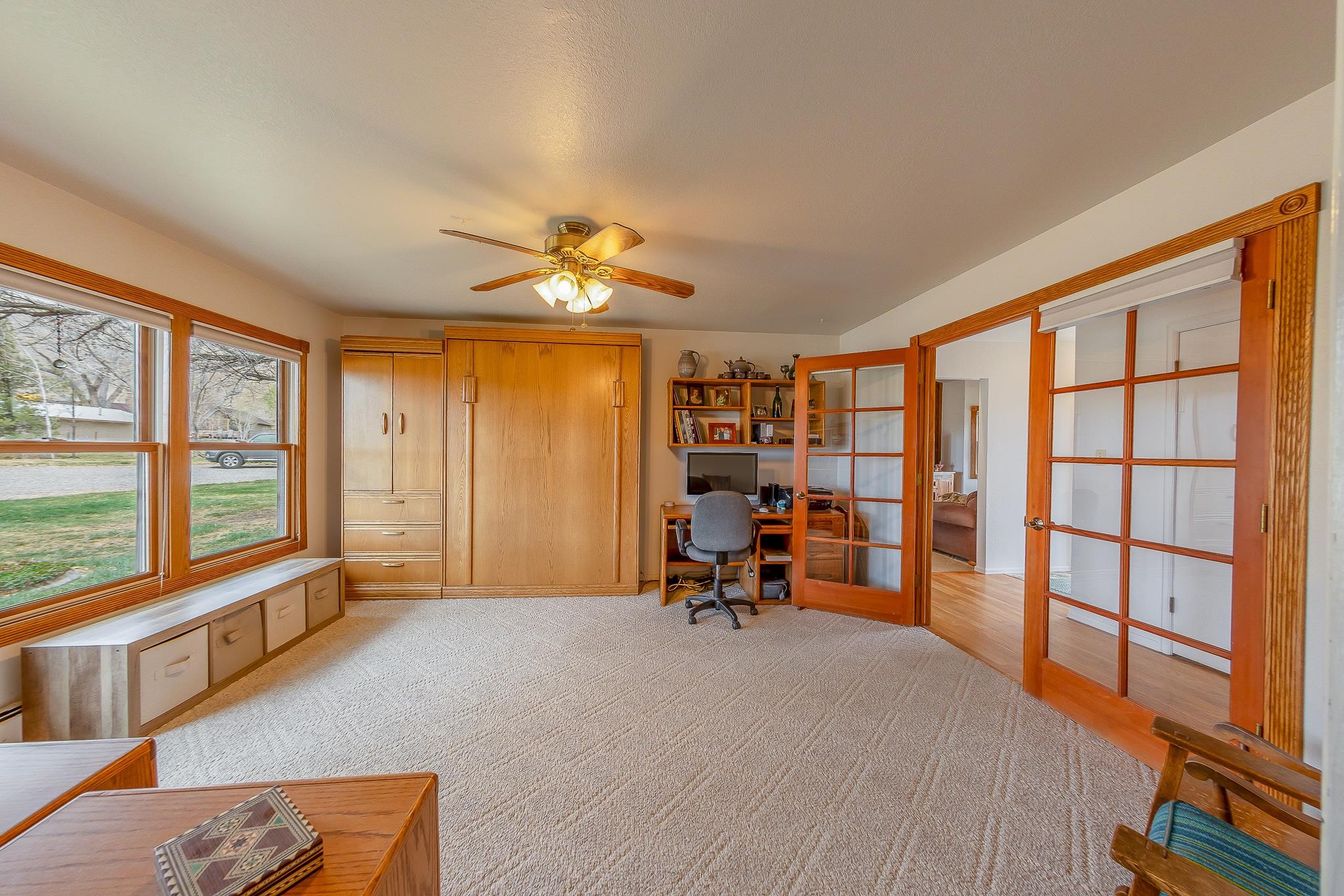 733-35 35 6/10 Road Palisade, CO 81526 - Photo 12 of 42 a view of a livingroom with furniture and a window