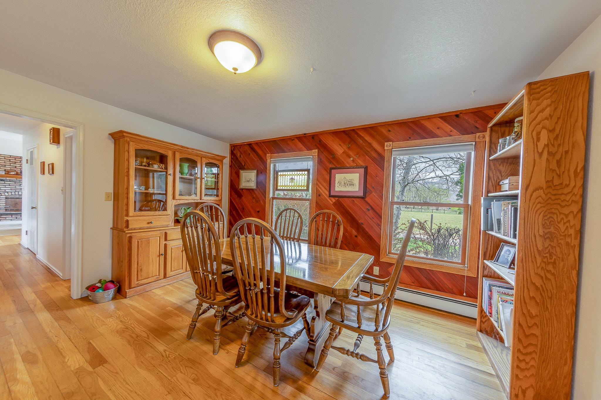 733-35 35 6/10 Road Palisade, CO 81526 - Photo 15 of 42 a view of a dining room with furniture window and wooden floor