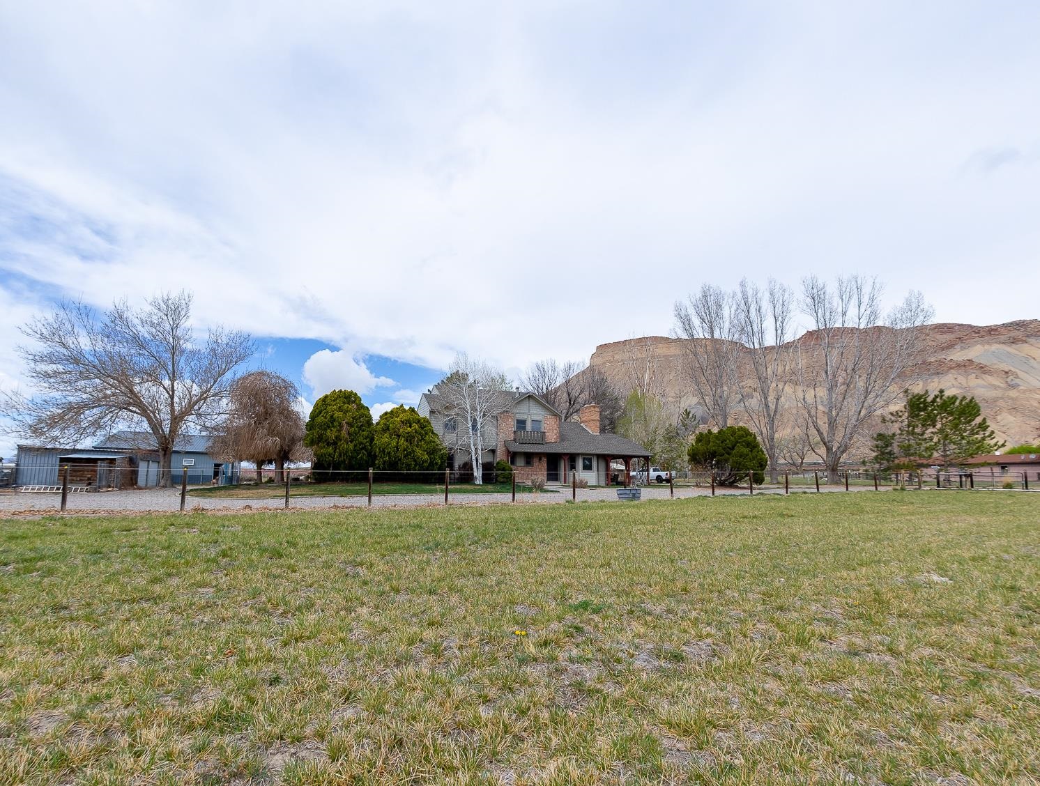 733-35 35 6/10 Road Palisade, CO 81526 - Photo 2 of 42 a view of a park with large trees