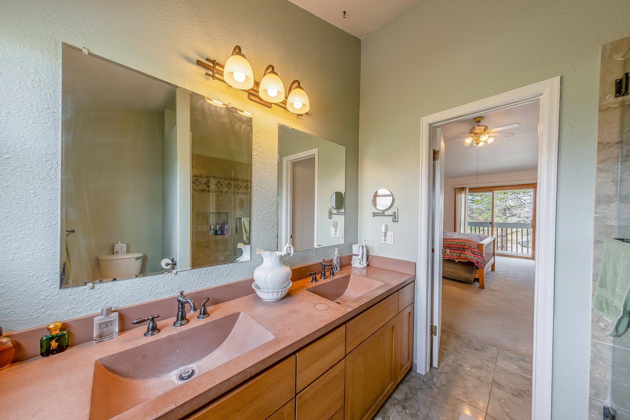 733-35 35 6/10 Road Palisade, CO 81526 - Photo 29 of 42 a spacious bathroom with a double vanity sink and a mirror