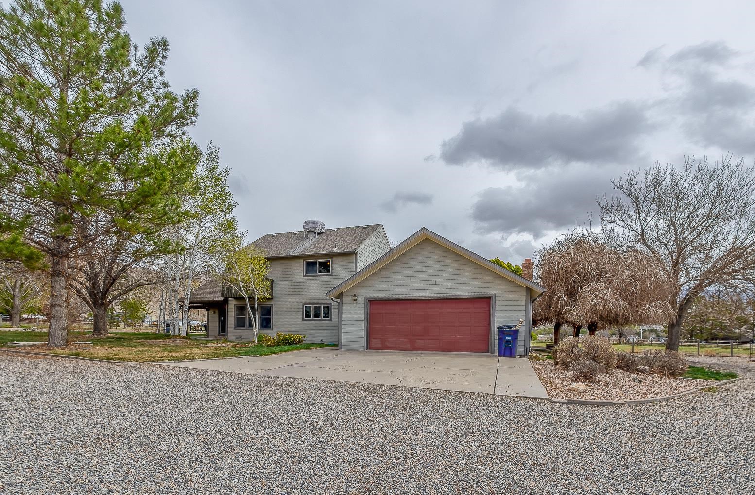 733-35 35 6/10 Road Palisade, CO 81526 - Photo 33 of 42 a house with trees in front of it