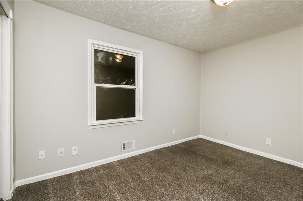 3864 McGill Lane Decatur, GA 30034 - Photo 13 of 25 an empty room with a window