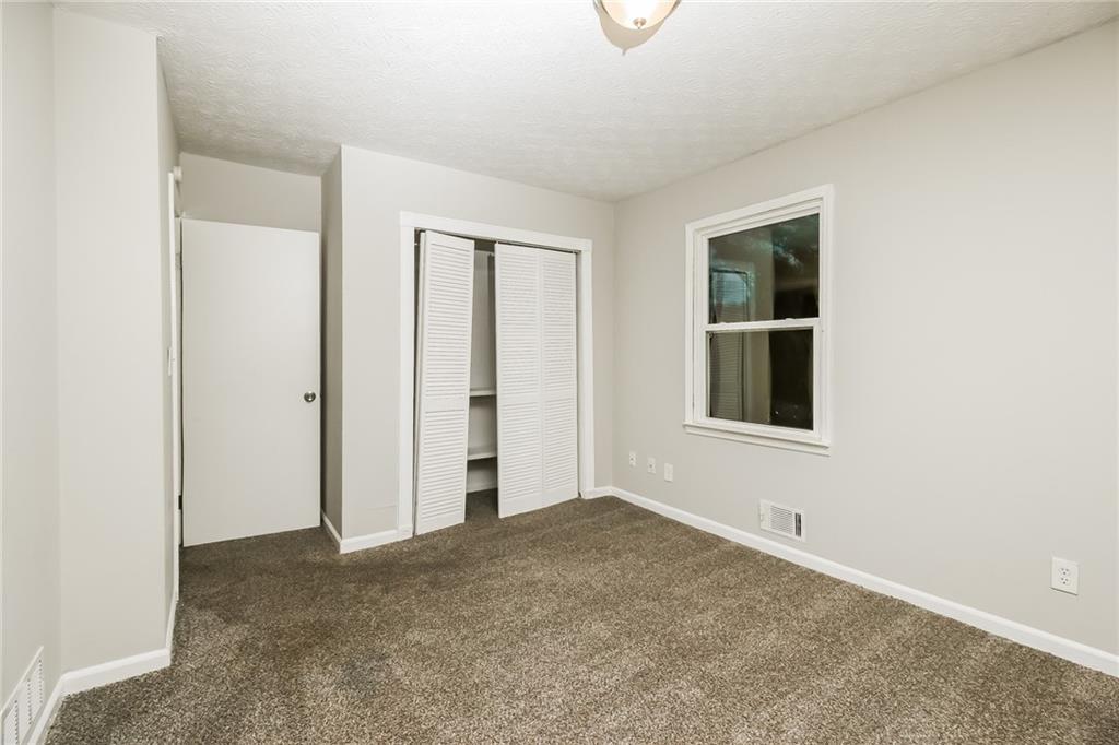3864 McGill Lane Decatur, GA 30034 - Photo 16 of 25 a view of an empty room with window and closet