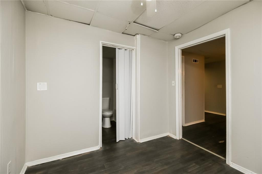 3864 McGill Lane Decatur, GA 30034 - Photo 19 of 25 an empty room with wooden floor door and closet