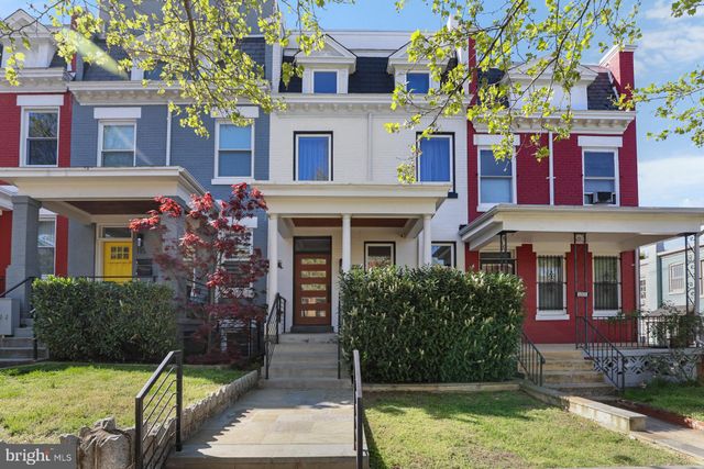 a front view of a multi story residential apartment building
