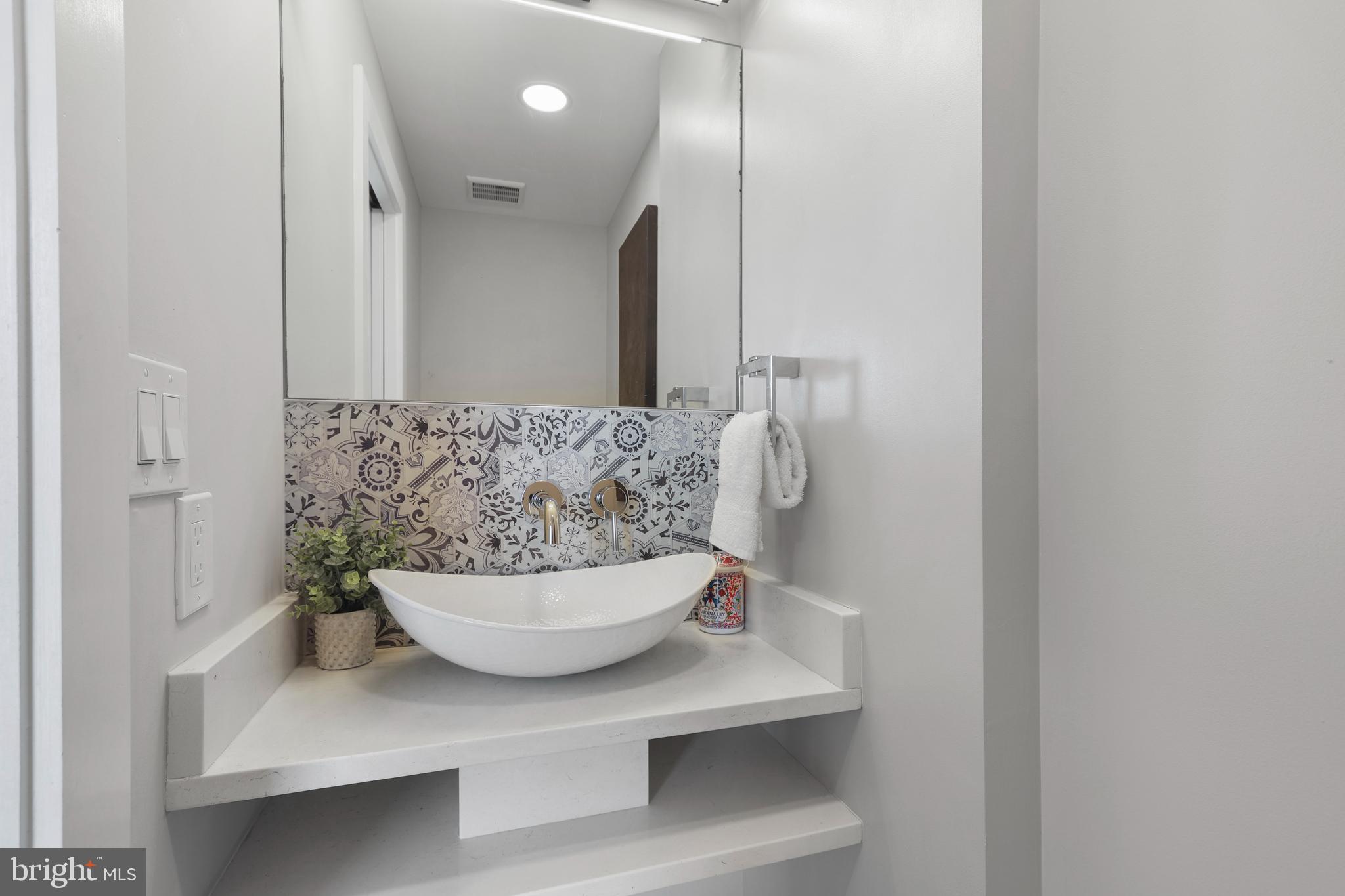 113 U Street Northeast, Unit 1 Washington, DC 20002 - Photo 23 of 63 a view of living room with furniture and potted plant