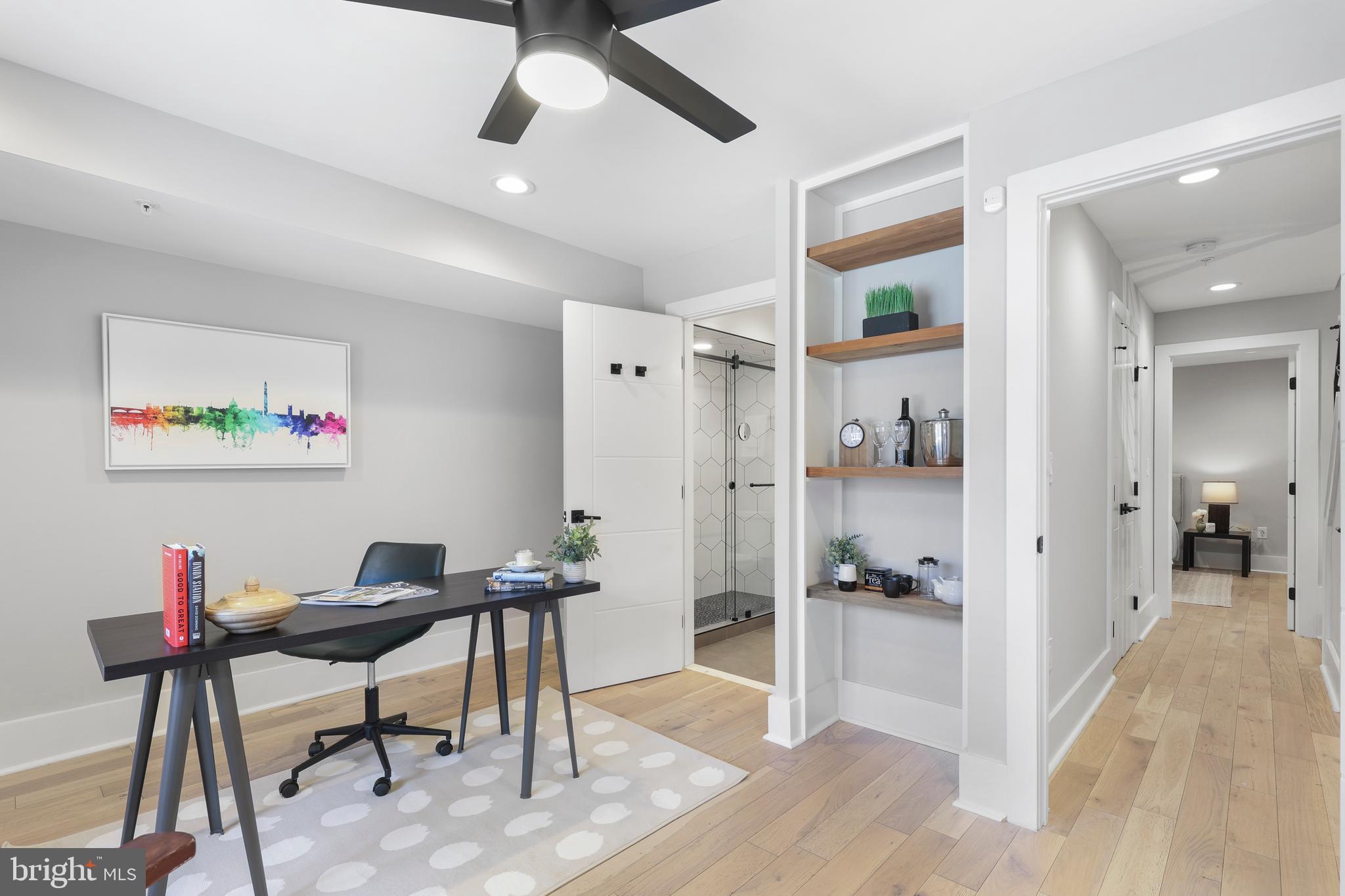 113 U Street Northeast, Unit 1 Washington, DC 20002 - Photo 38 of 63 a workspace with furniture and a chandelier