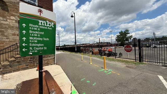 113 U Street Northeast, Unit 1 Washington, DC 20002 - Photo 59 of 63 a view of a chair and tables in the patio