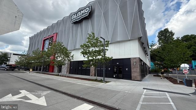 113 U Street Northeast, Unit 1 Washington, DC 20002 - Photo 61 of 63 a view of a house with a yard and garage