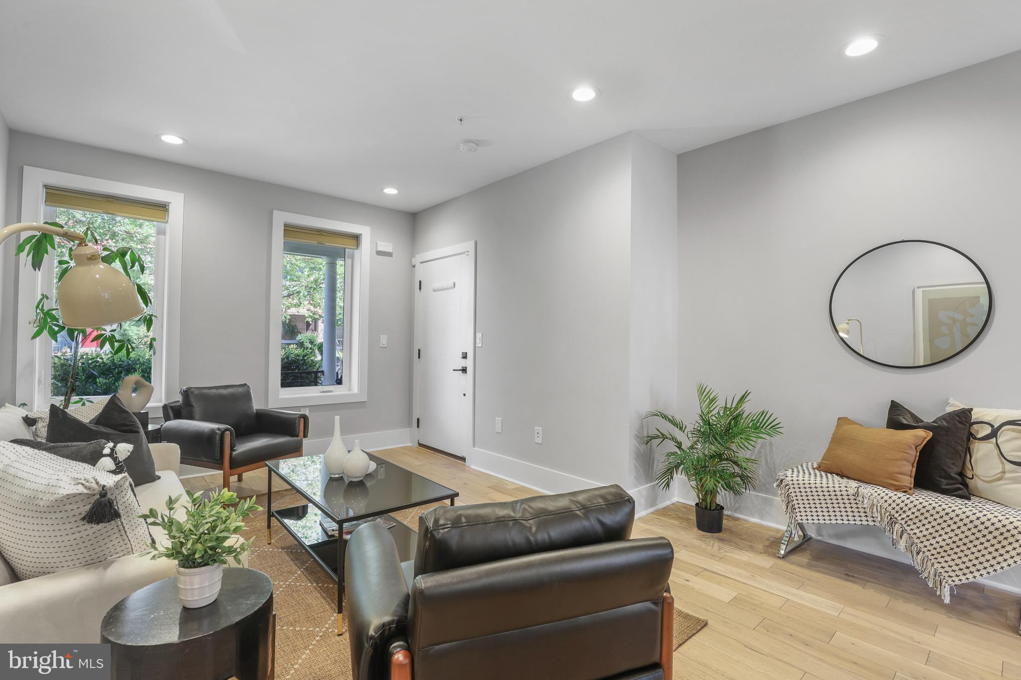 113 U Street Northeast, Unit 1 Washington, DC 20002 - Photo 9 of 63 a living room with furniture flowerpot and window