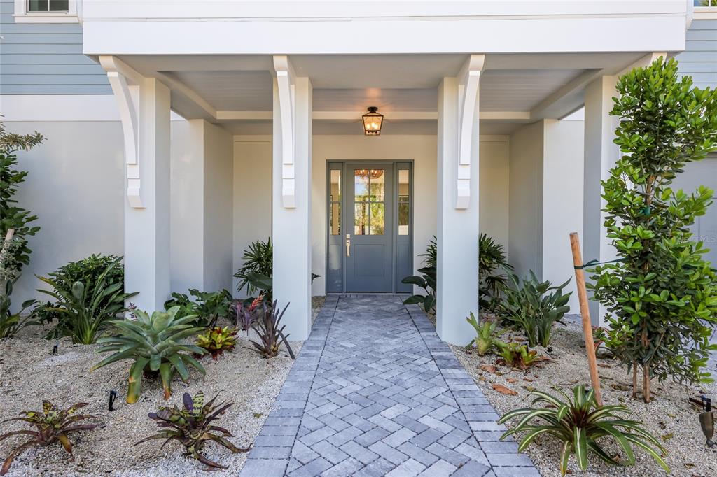 215 Sycamore Avenue Anna Maria, FL 34216 - Photo 4 of 75 a front view of a house