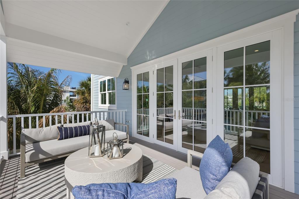 215 Sycamore Avenue Anna Maria, FL 34216 - Photo 52 of 75 a living room with furniture and a large window