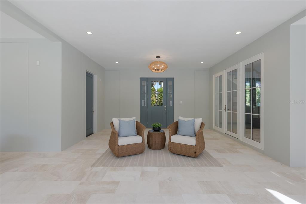 215 Sycamore Avenue Anna Maria, FL 34216 - Photo 53 of 75 a living room with furniture and window