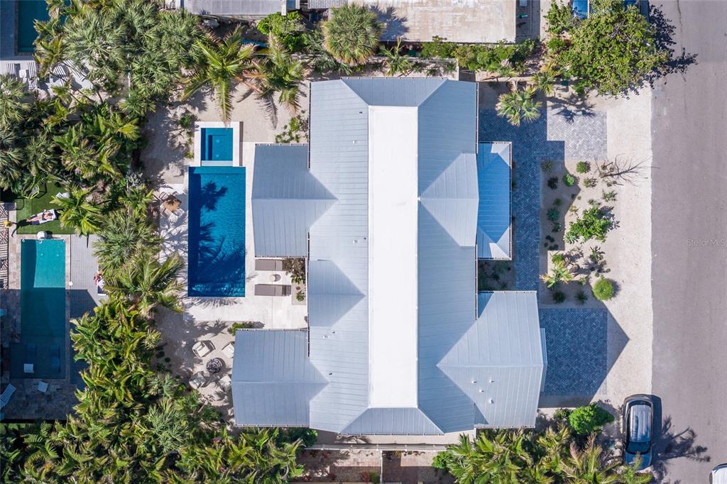 215 Sycamore Avenue Anna Maria, FL 34216 - Photo 75 of 75 an aerial view of a house with outdoor space