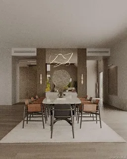 a living room with furniture and large windows