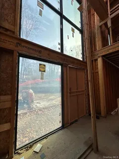 a view of an empty room with a balcony