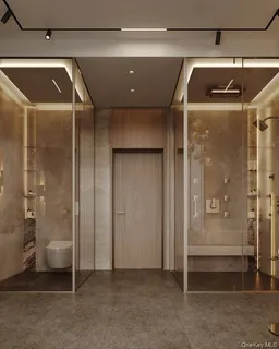 a bathroom with a glass shower door