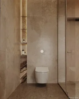 a living room with furniture and potted plant