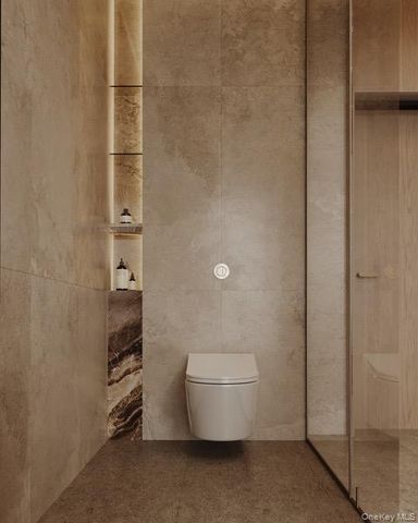 a living room with furniture and potted plant