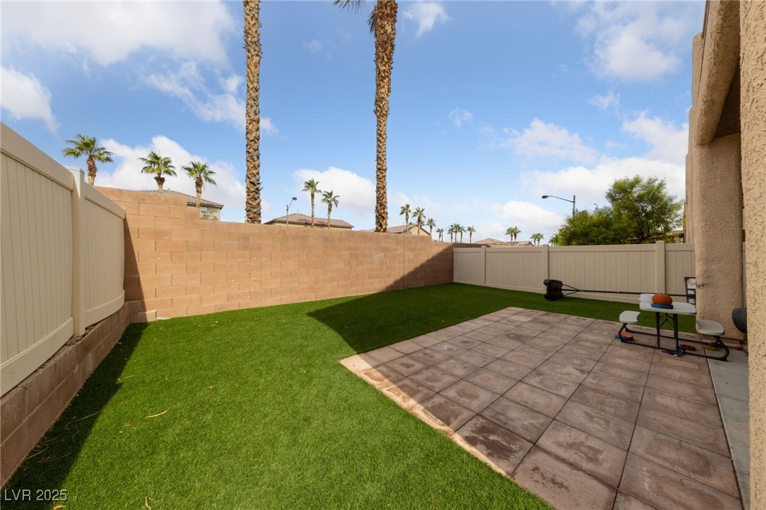 9068 Bushy Tail Avenue, Unit 103 Las Vegas, NV 89149 - Photo 20 of 32 Fenced backyard
