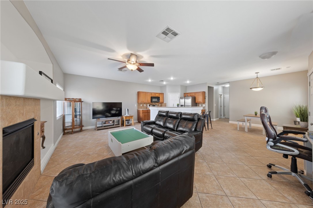 9068 Bushy Tail Avenue, Unit 103 Las Vegas, NV 89149 - Photo 21 of 32 Living room