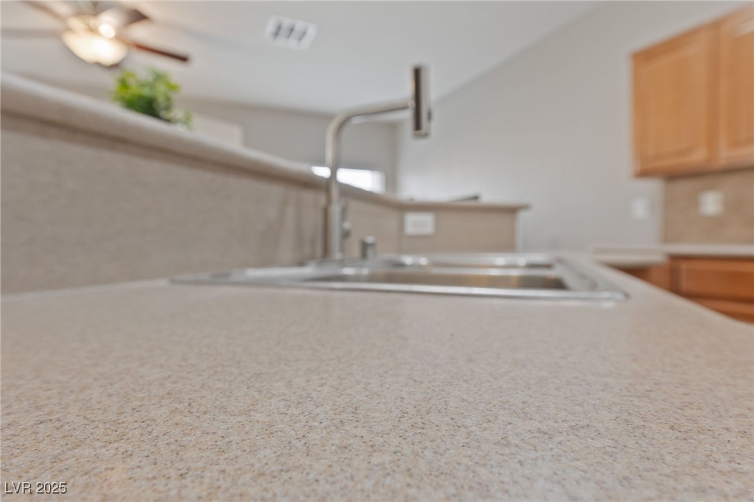 9068 Bushy Tail Avenue, Unit 103 Las Vegas, NV 89149 - Photo 27 of 32 Solid Surface Countertops
